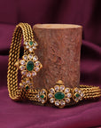 GOLD POLISHED FLORAL STONE BANGLE