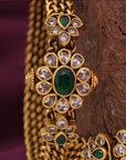 GOLD POLISHED FLORAL STONE BANGLE