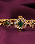 GOLD POLISHED FLORAL STONE BANGLE