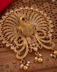STONE STUDDED PEACOCK PENDANT.