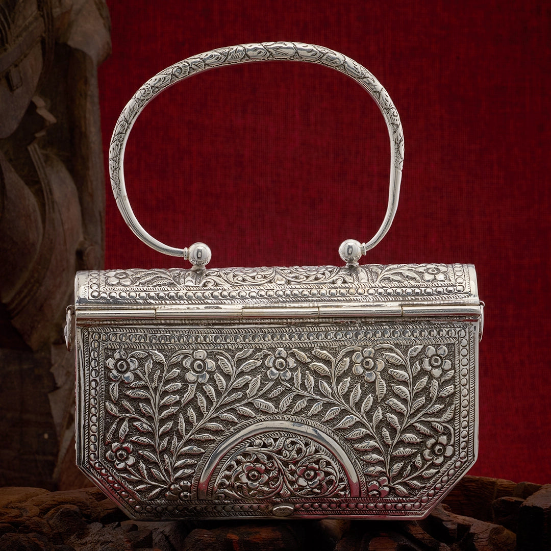 BOTANICA SILVER CLUTCH