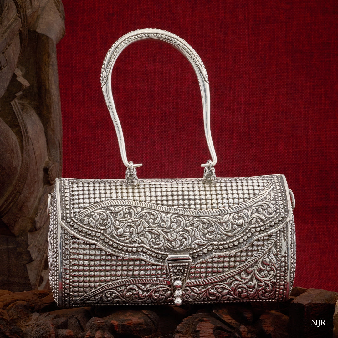 ROYAL WEAVE CLUTCH
