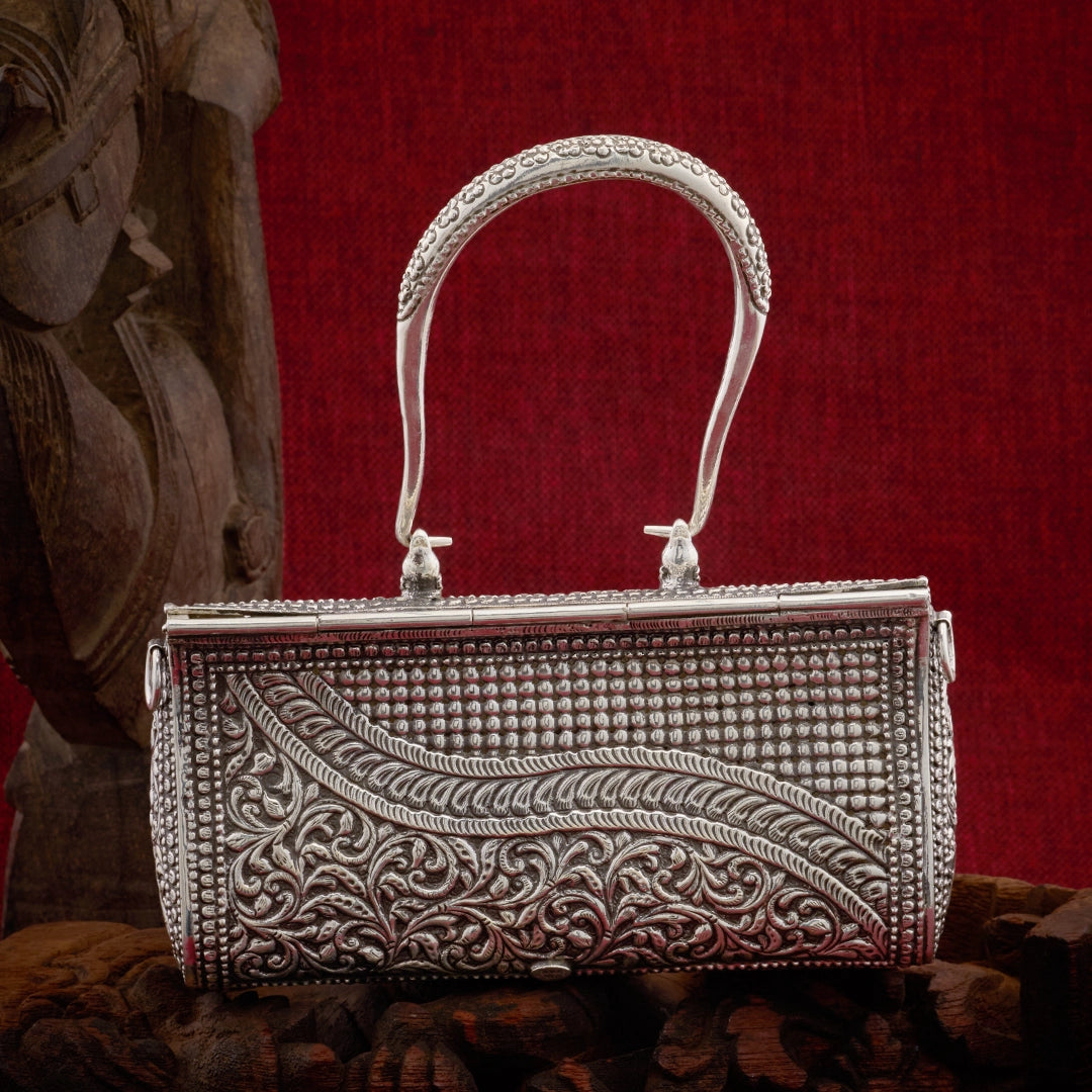 ROYAL WEAVE CLUTCH