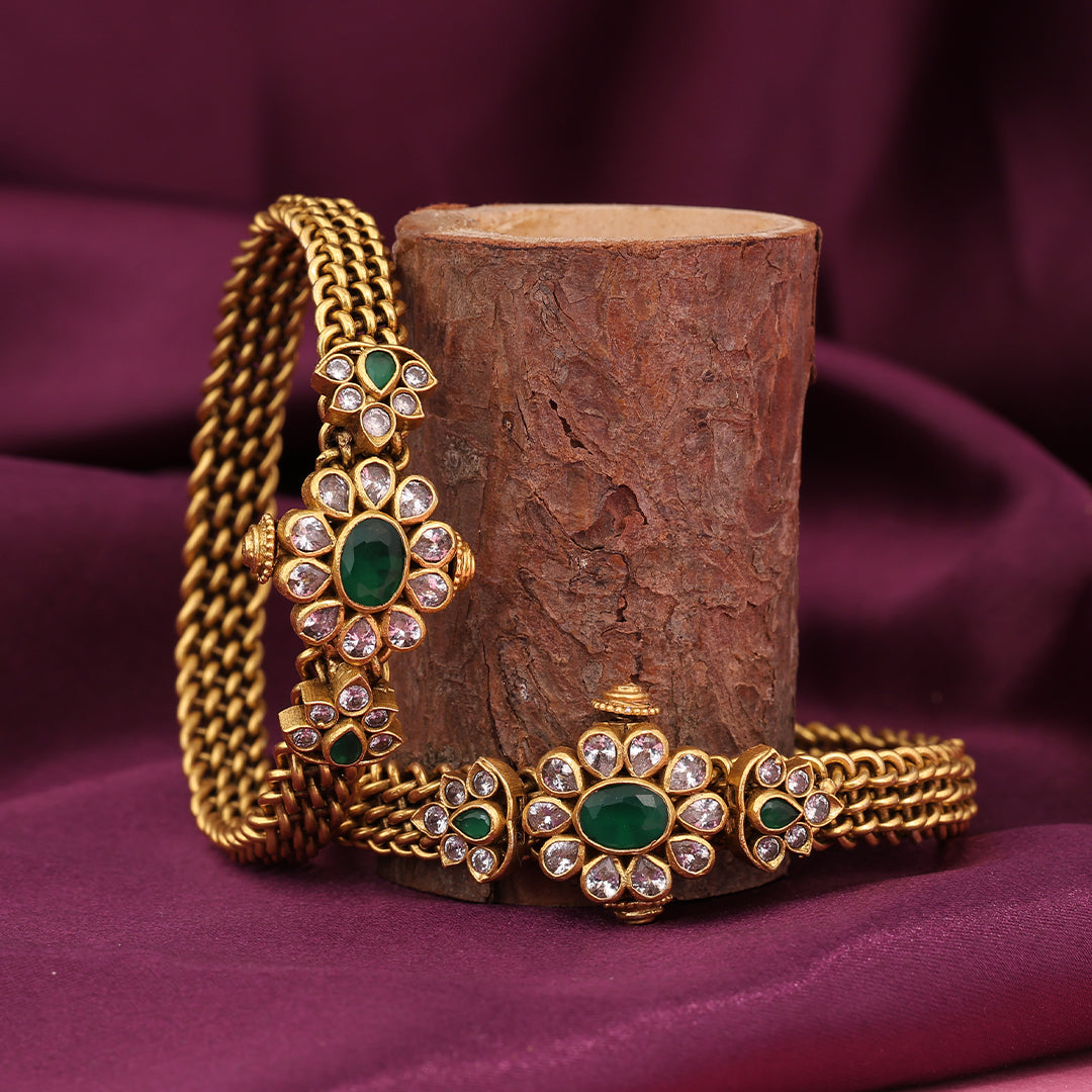 GOLD POLISHED FLORAL STONE BANGLE