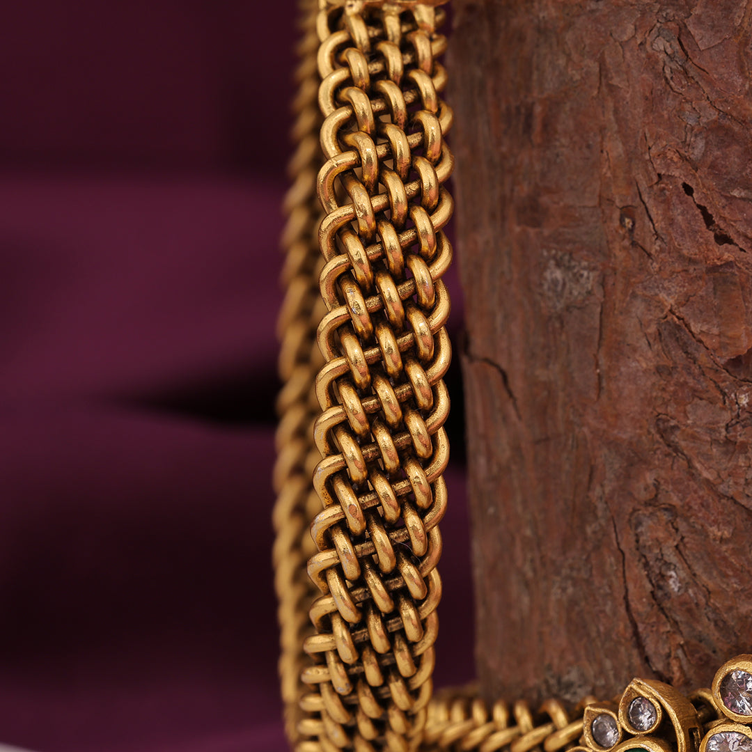 GOLD POLISHED FLORAL STONE BANGLE